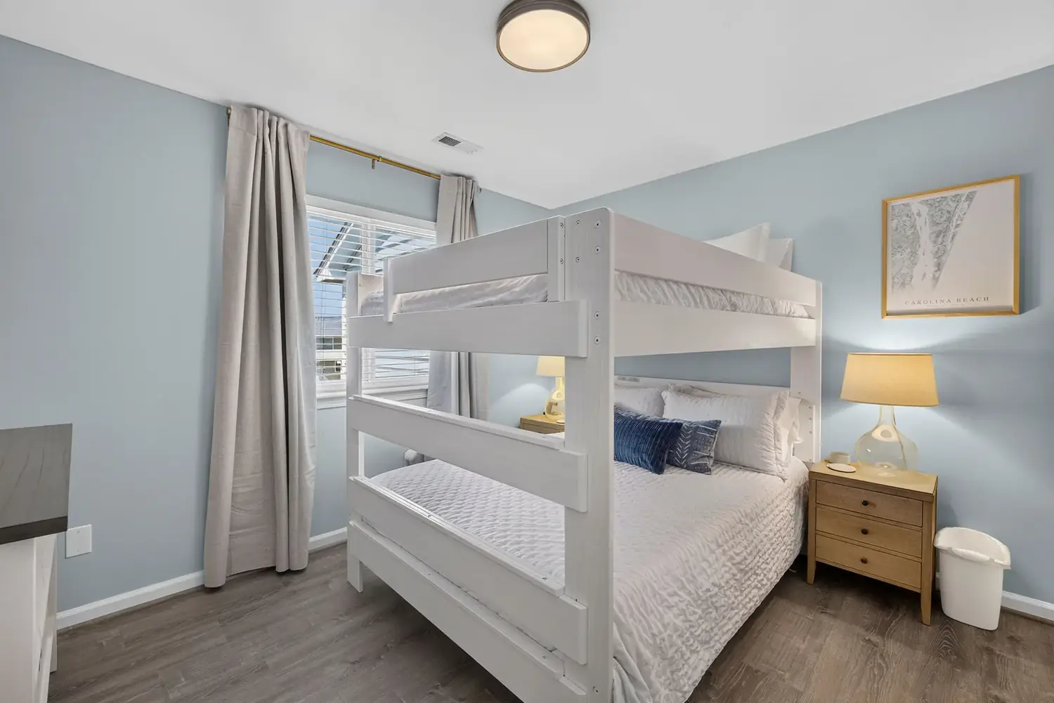Bunk room with a queen-over-queen bunk bed