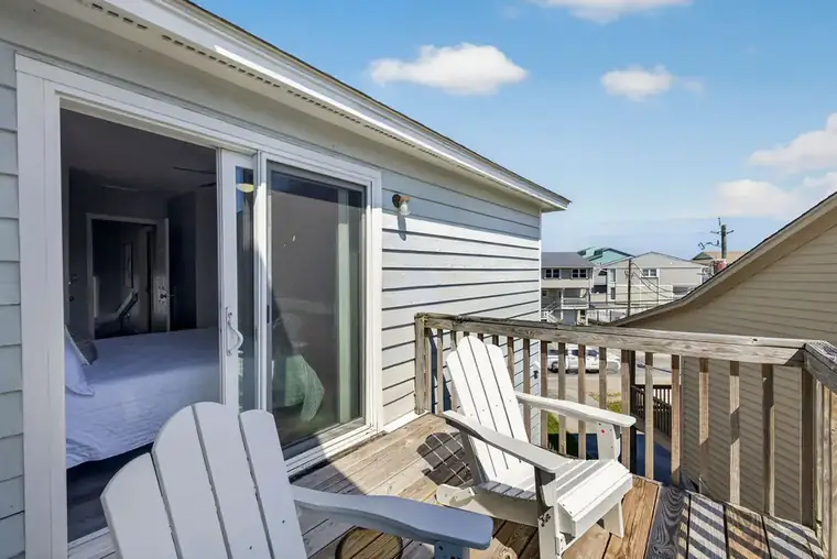 Private balcony off the primary bedroom
